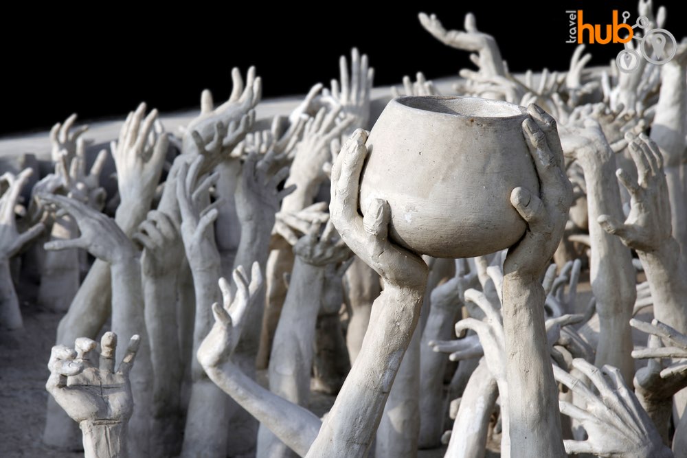 The hands sculpture at Wat Rong Khun