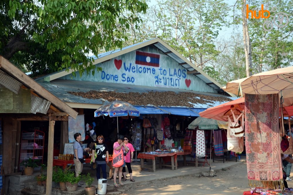 and vist a small Laos market